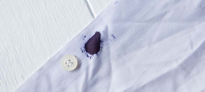 Mancha de tinta en camisa