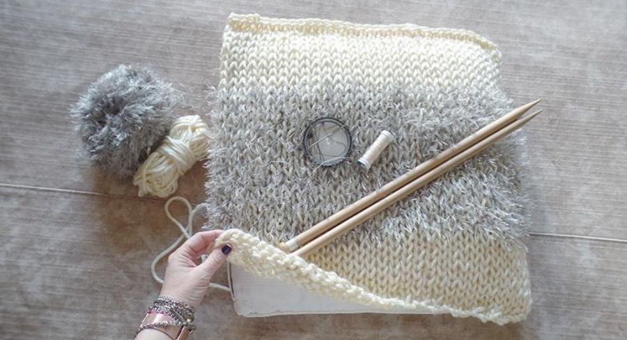 Lado de funda de cojín en lana.